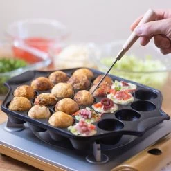 Iwachu Nambu Cast Iron 23-Ball Takoyaki Pan 17 Iwachu Nambu Cast Iron 23-Ball Takoyaki Pan -Professional Furniture And Kitchen Supplies Store IwachuNambuCastIron23 BallTakoyakiPan 2